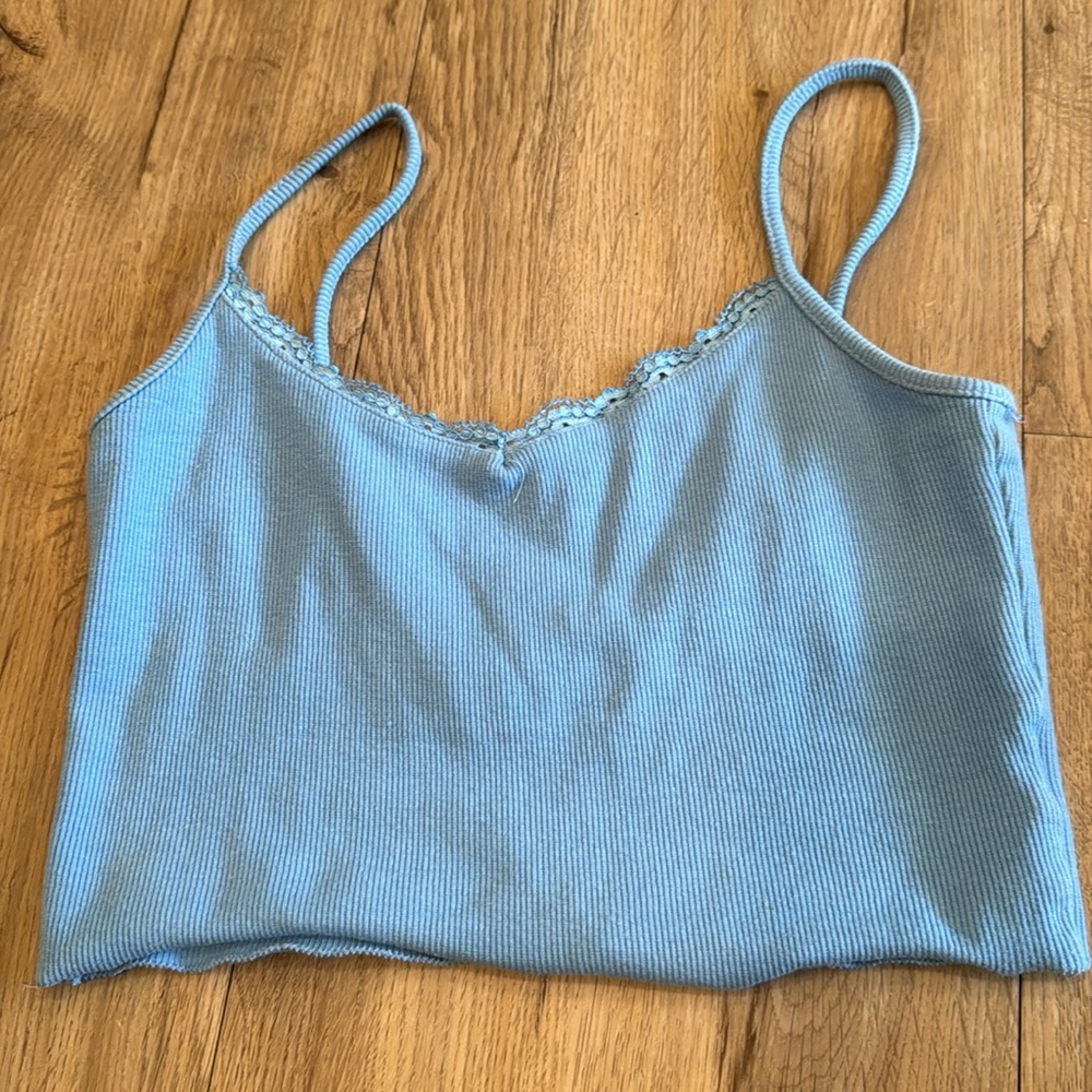 I’m selling a blue, cropped, tanktop.